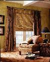 Drapery Panels in conjunction with Hunter Douglas Woven Wood Shades -- Lantana Florida Home