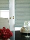 Gorgeous hobbled fabric Roman shades/blinds mounted on FrIsland french doors -- Jupiter Florida
