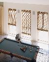 Too cool for pool! Woven wood translucent flat Roman version -- Palm Beach Gardens Estate
