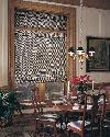 Woven Wood Roman Shades -- Flat version in dining room -- Lantana Florida