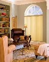 Vertical Blinds mounted below an arch in this reading/Family room -- Delray Beach Florida