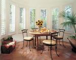White Composite/Faux  Wood that Plantation Shutters for Bay areaof this Singer Island Florida Apartment/Townhouse