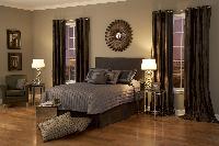 Masculine Curtains on drapery Rod in conjunction with coordinated custom bedding Duvet cover and pillows -- Jupiter Florida