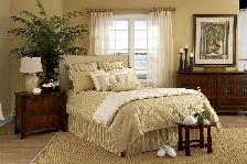 Window sheers in conjunction with custom-made bedding and pillows for this beautiful Boca Raton residence
