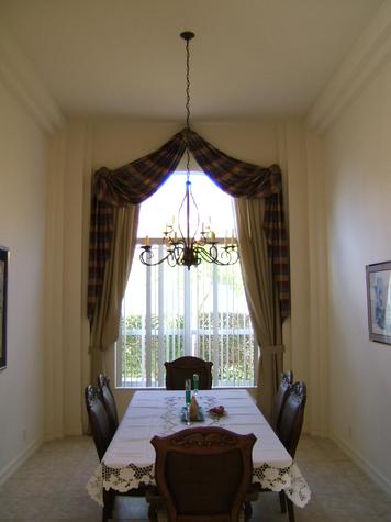 Decorative Window Treatment with drapery panels - Vertical Blinds-- Jupiter Residence