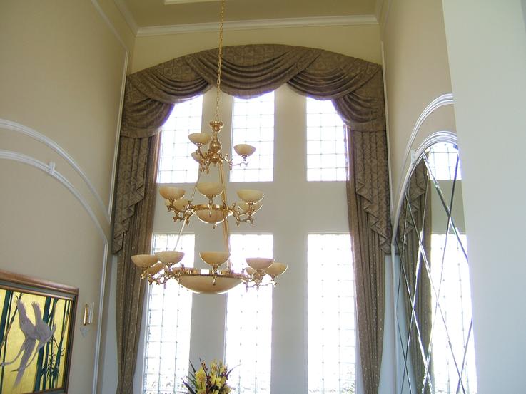 Arched Swag Window treatment width panels in Jupiter Country club, Florida